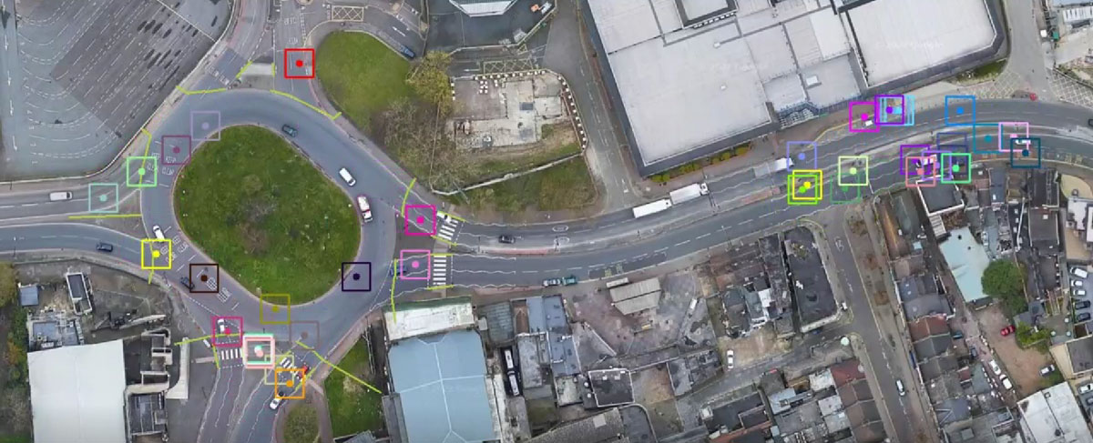 This image captures what our algorithm sees. Due to it's size, multiple cameras were required to capture this location. Using Route Konnect allows the full movement of each road user to be preserved anonymously as they move through the roundabout across the different camera views.  